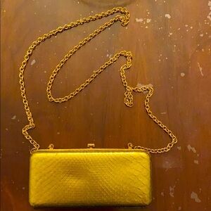 NWT Truex gold mini bag size: 6” x 2.5”